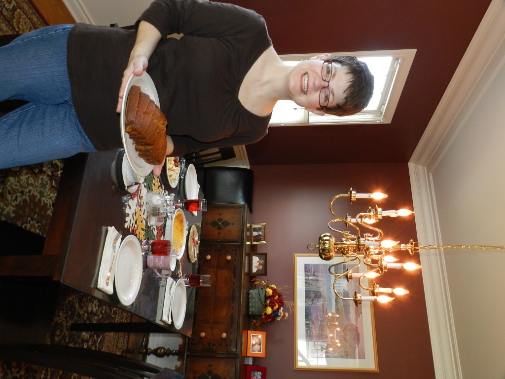 Jennifer at Thanksgiving Brunch with pumpkin bread